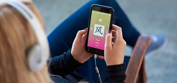 Language learning app development with quizzes and immersive lessons for kids